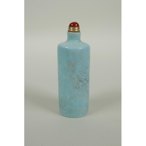 93 - A Chinese turquoise glazed porcelain cylinder snuff bottle with allover floral decoration, 2 charact... 