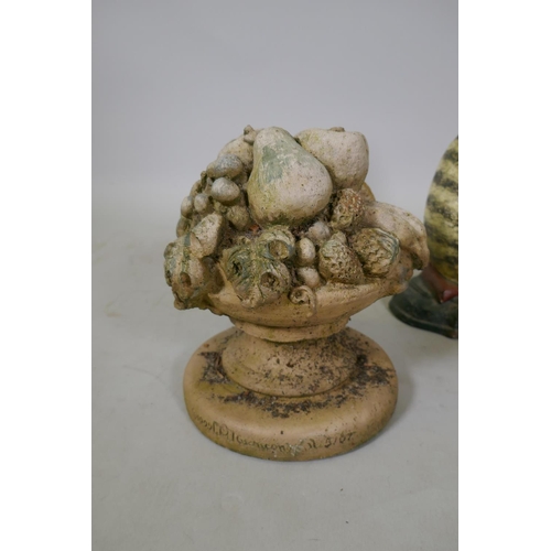 179 - A painted iron doorstop in the form of a cat, another in the form of a basket of flowers, and two co... 