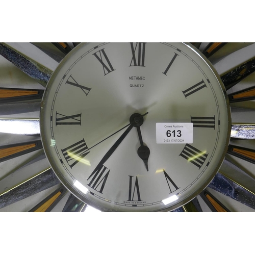 648 - A vintage Metamec battery operated Quartz sunburst wall clock, AF two blade detached, 60cm diameter