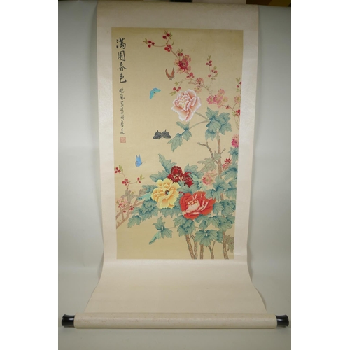 257 - A Chinese hand coloured printed scroll depicting butterflies amongst flowers, 46 x 86cm