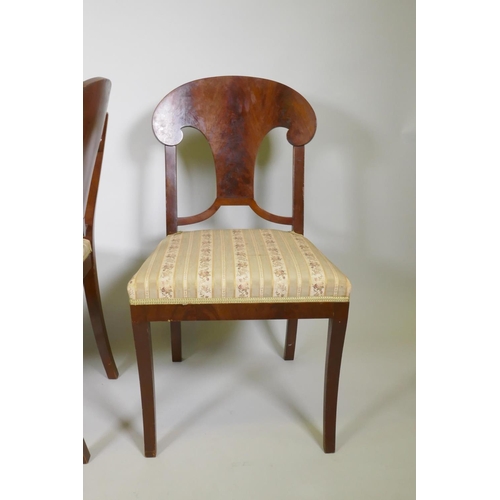 1005 - A set of three C19th Scandinavian flame mahogany Gustavian style side chairs