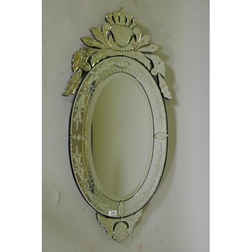 1006 - A vintage Venetian wall mirror with etched and cut decoration, 114 x 51cm