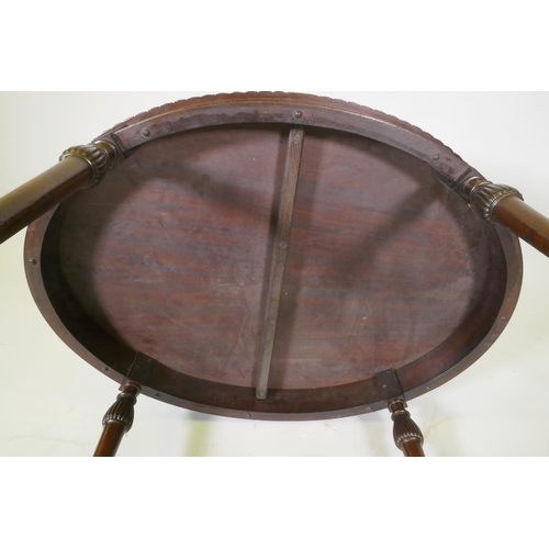 1007 - A C19th mahogany oval shaped occasional table in the manner of Gillows, with gadrooned edge and cros... 