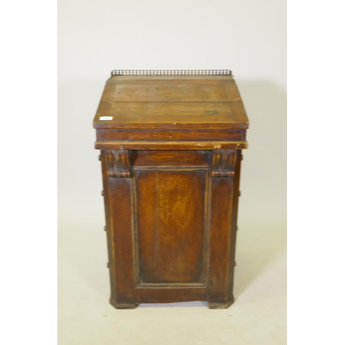 1016 - C19th painted and grained pine Davenport, with three quarter brass gallery and lift up top, four tru... 