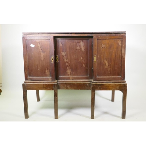 1017 - Georgian mahogany silver chest/canteen on stand, the inverted breakfront top over two cupboards fitt... 