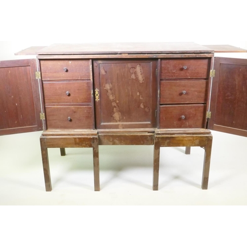 1017 - Georgian mahogany silver chest/canteen on stand, the inverted breakfront top over two cupboards fitt... 