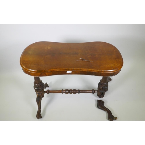 1020 - Victorian rosewood stretcher table, with shaped top and carved and turned columns, with cabriole sup... 