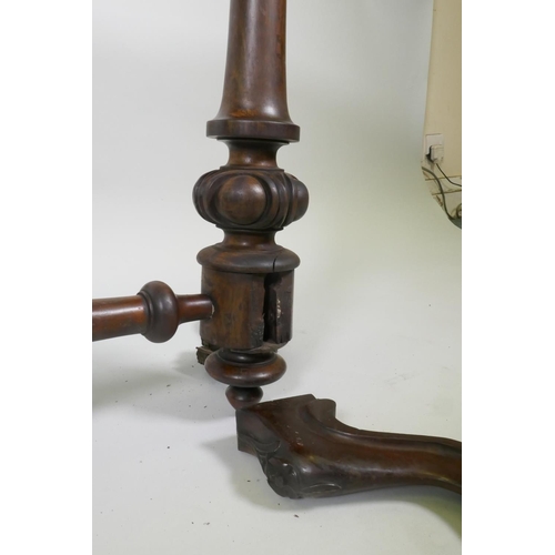 1020 - Victorian rosewood stretcher table, with shaped top and carved and turned columns, with cabriole sup... 