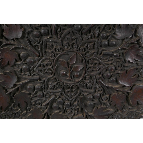 1021 - A C19th carved hardwood font cover/table top, with scrolling vine decoration, 66 x 66cm