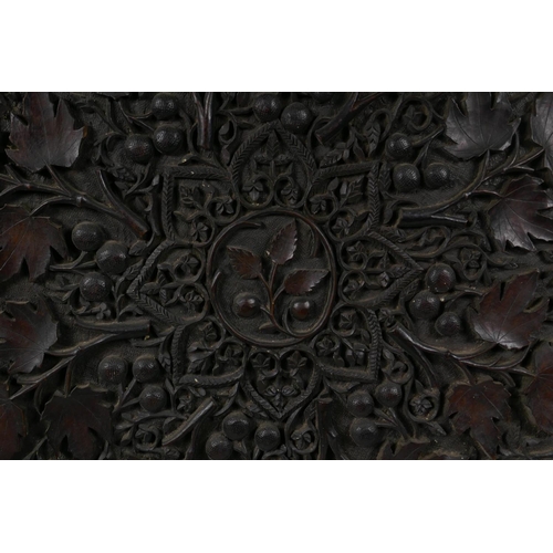 1021 - A C19th carved hardwood font cover/table top, with scrolling vine decoration, 66 x 66cm