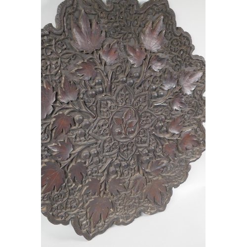 1021 - A C19th carved hardwood font cover/table top, with scrolling vine decoration, 66 x 66cm