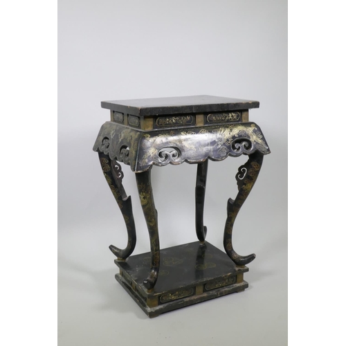 1037 - A Chinese export black lacquer vase stand with gilt decoration, carved and pierced frieze, raised on... 