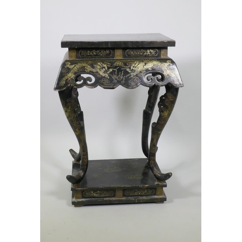 1037 - A Chinese export black lacquer vase stand with gilt decoration, carved and pierced frieze, raised on... 