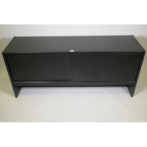 1051 - A Danish black ash sideboard with two slide doors, 152 x 44 x 66cm