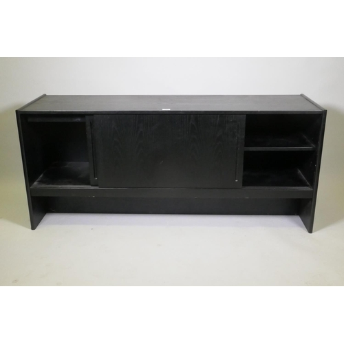 1051 - A Danish black ash sideboard with two slide doors, 152 x 44 x 66cm