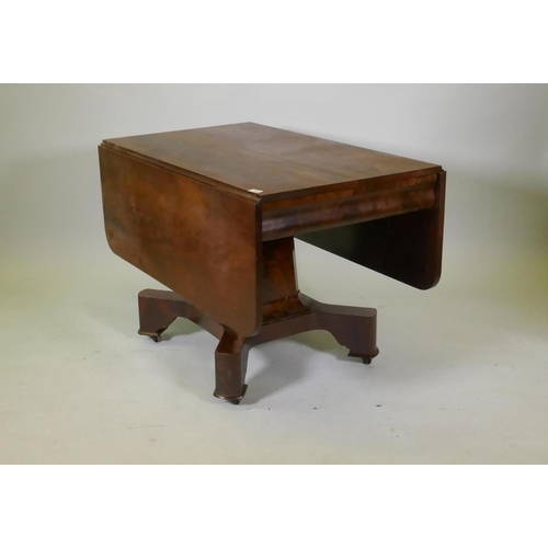 1055 - C19th figured mahogany drop leaf centre table, with moulded frieze, raised on a shaped column and pl... 