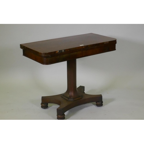 1058 - Early C19th rosewood card table, with fold out top and baized interior, raised on a tapering hexagon... 