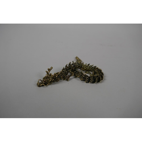 106 - A Japanese Jizai style articulated bronze okimono dragon, 23cm long