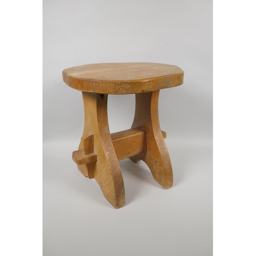 1062 - A rustic pegged elm stool, 30cm high