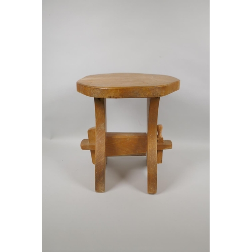 1062 - A rustic pegged elm stool, 30cm high