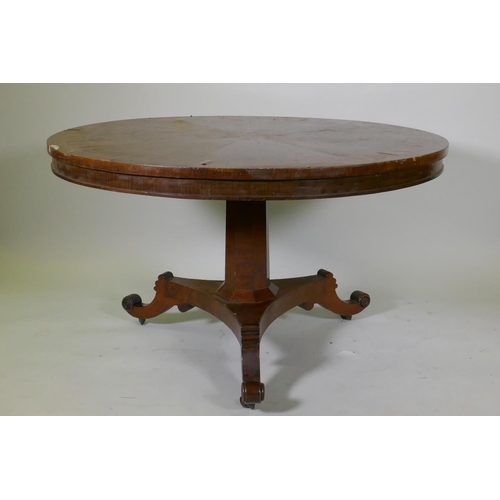 1064 - C19th tilt top breakfast table, the top with rosewood banding and fiddle back veneer, raised on an o... 