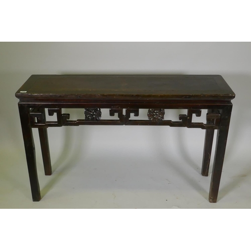 1066 - A Chinese hardwood altar table with carved peach tree details to frieze, 134 x 39cm, 83cm high