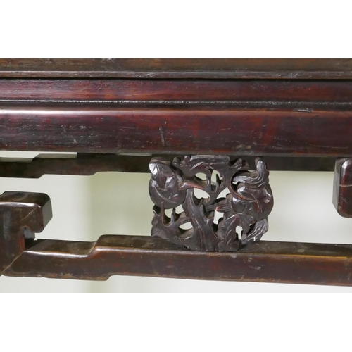 1066 - A Chinese hardwood altar table with carved peach tree details to frieze, 134 x 39cm, 83cm high