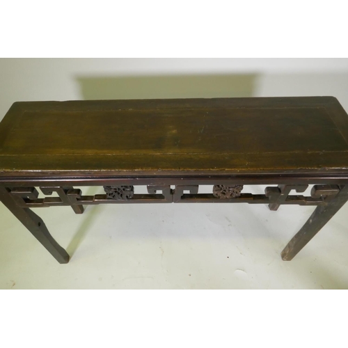 1066 - A Chinese hardwood altar table with carved peach tree details to frieze, 134 x 39cm, 83cm high