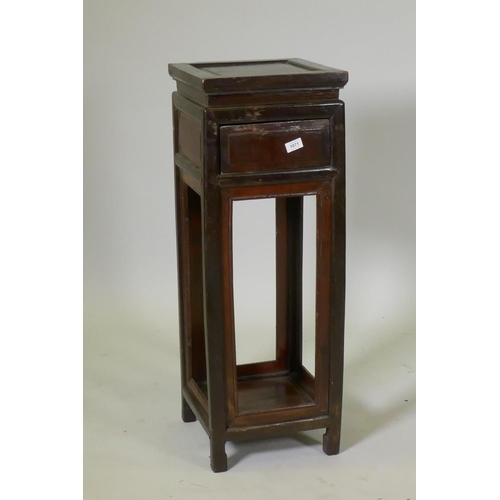 1071 - A Chinese hardwood plant stand with single drawer, 34 x 34cm, 93cm high