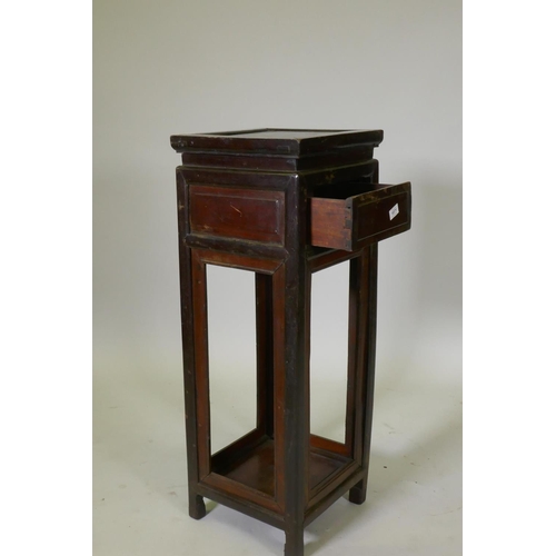 1071 - A Chinese hardwood plant stand with single drawer, 34 x 34cm, 93cm high