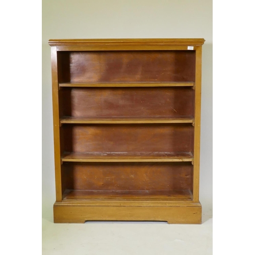 1079 - A Victorian mahogany open bookcase with three fixed shelves, raised on a plinth base, 109 x 29 x 133... 