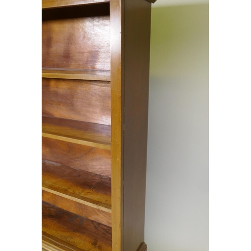 1079 - A Victorian mahogany open bookcase with three fixed shelves, raised on a plinth base, 109 x 29 x 133... 