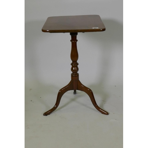 1081 - A Victorian mahogany tilt top occasional table, raised on a turned column and tripod supports, 54 x ... 