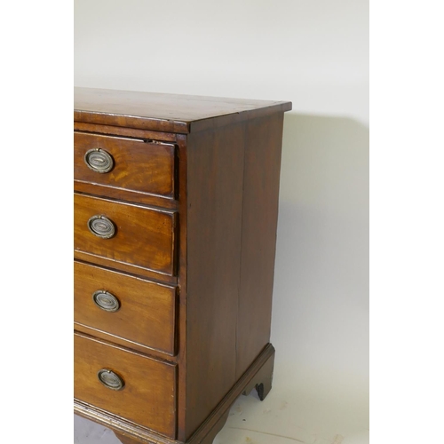 1084 - A Georgian mahogany chest of four long drawers with cockbeaded fronts, oak linings and brass plate h... 