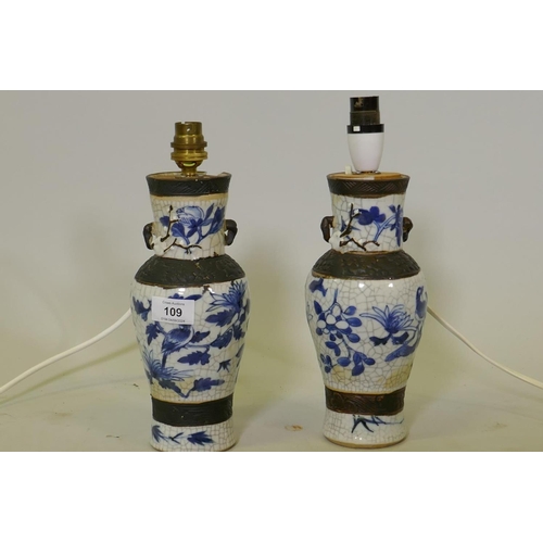 109 - A pair of antique Chinese crackleware vases with blue and white decoration, converted to table lamps... 