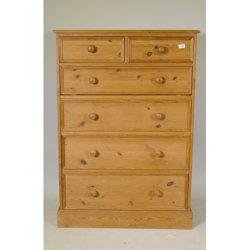 1090 - A contemporary pine chest of two over four drawers, on a plinth base, 90 x 46 x 127cm