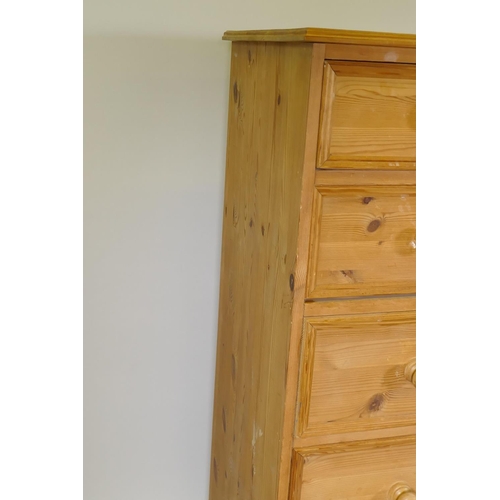 1090 - A contemporary pine chest of two over four drawers, on a plinth base, 90 x 46 x 127cm