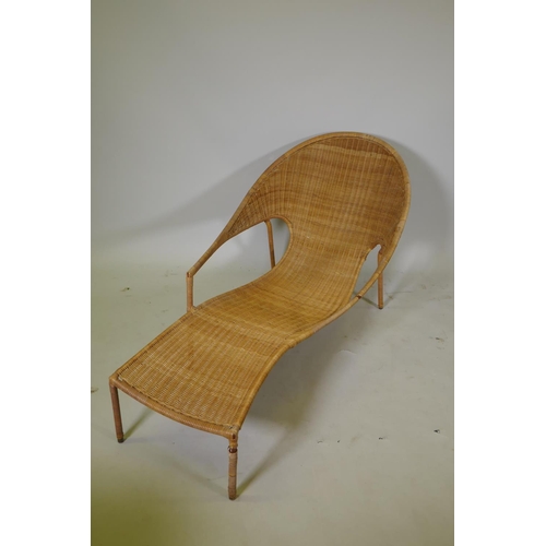 1096 - A mid century cane&nbsp; on metal frame day bed/chaise longue, 153cm long