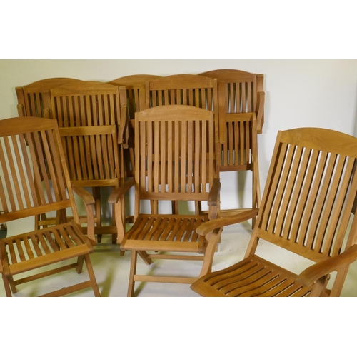 1104 - A set of eight Regency teak folding garden chairs