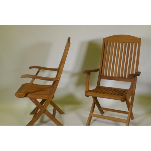 1104 - A set of eight Regency teak folding garden chairs