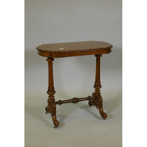 1107 - A good Victorian inlaid figured walnut stretcher table, with shaped top, raised on fluted and carved... 