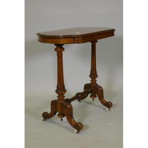 1107 - A good Victorian inlaid figured walnut stretcher table, with shaped top, raised on fluted and carved... 