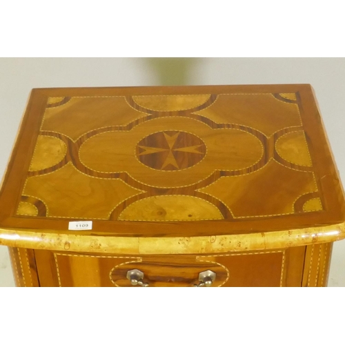 1109 - A Maltese marquetry inlaid three drawer bow fronted commode, with brass handles, raised on shaped su... 