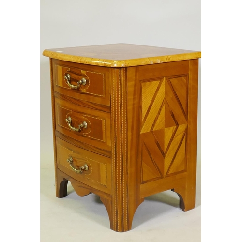 1109 - A Maltese marquetry inlaid three drawer bow fronted commode, with brass handles, raised on shaped su... 