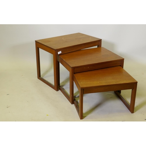 1125 - A nest of three teak veneered occasional tables, 61 x 41 x 46cm