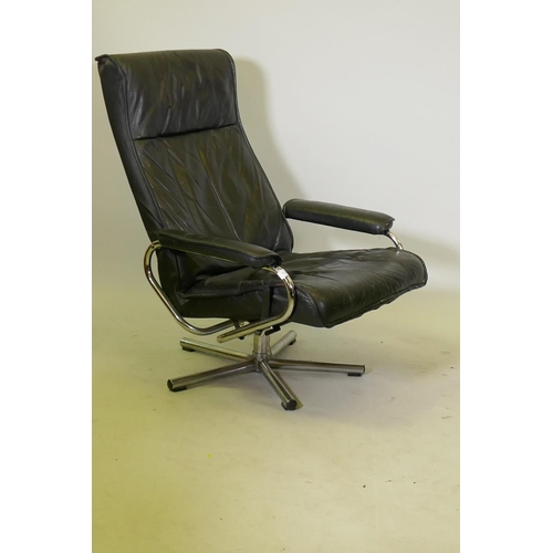 1127 - Kebe Danish leather reclining and swivel action arm chair, c.1970/80