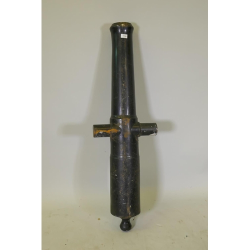 1134 - A metal and fibreglass skinned canon barrel, 128cm long, 7.5 bore