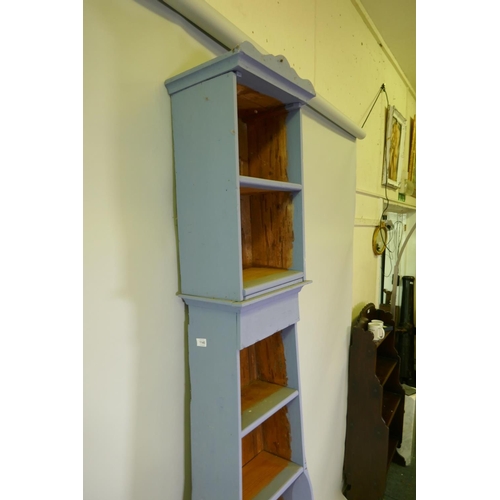 1145 - An C19th Swedish painted pine Mora clock case converted with open shelves, 225cm high