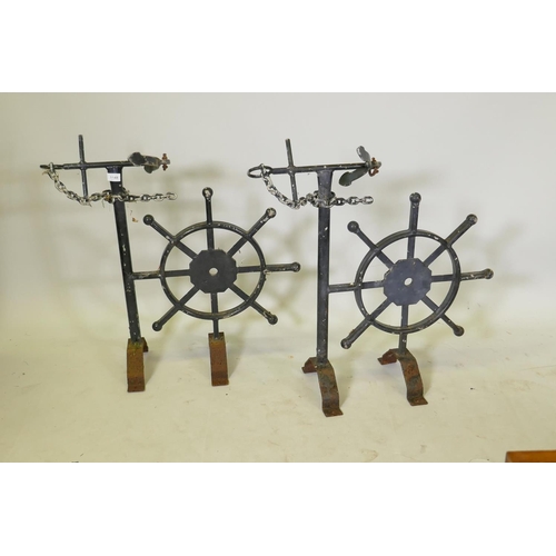 1148 - A pair of painted metal wall brackets with ship's wheel and anchor, by repute from the Royal Naval C... 