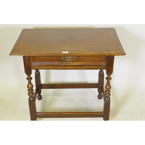 1149 - A William and Mary oak single drawer side table, raised on turned supports, united by stretchers, c.... 